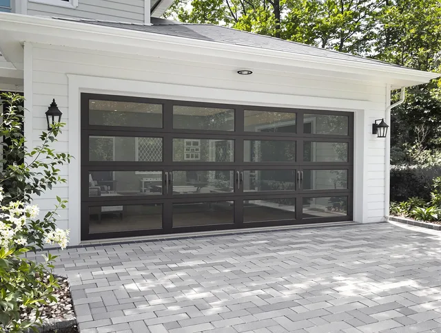 Parma Garage Door Repair design specialist presenting custom garage door options to Parma homeowner