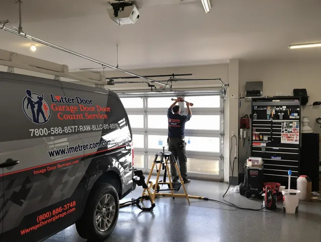 Parma Garage Door Repair team performing same-day garage door repair in Parma
