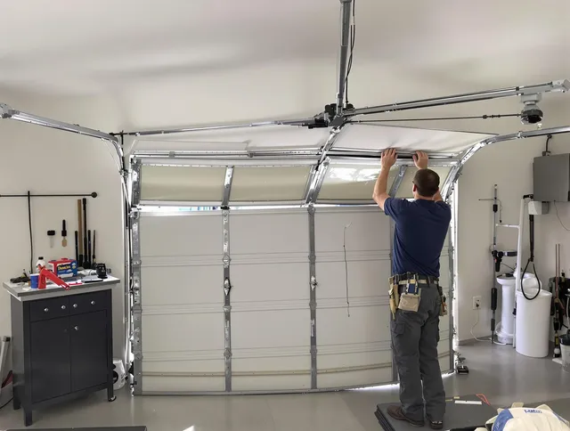 Parma Garage Door Repair specialist performing precise section replacement on Parma garage door