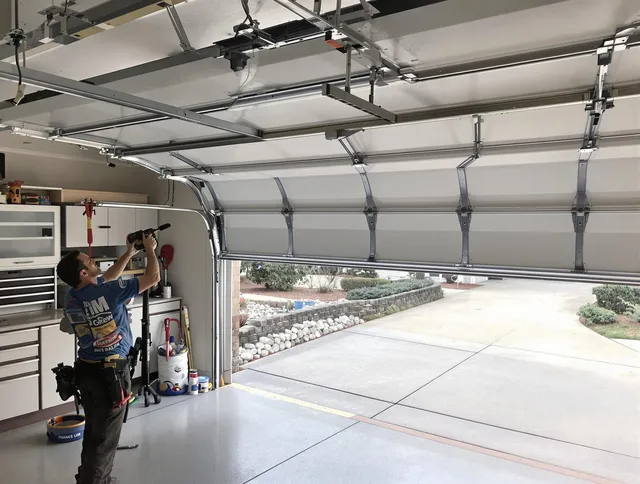 Garage door track repair service by Parma Garage Door Repair in Parma
